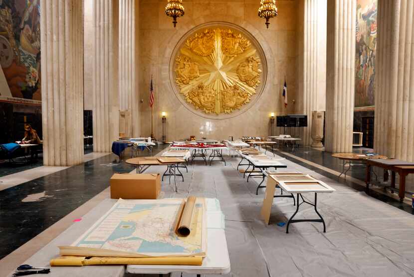 Salvaged historical items are laid out to dry in the Great Hall in the Hall of State...