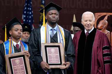 President Joe Biden, from right, poses with valedictorian DeAngelo Jeremiah Fletcher and...