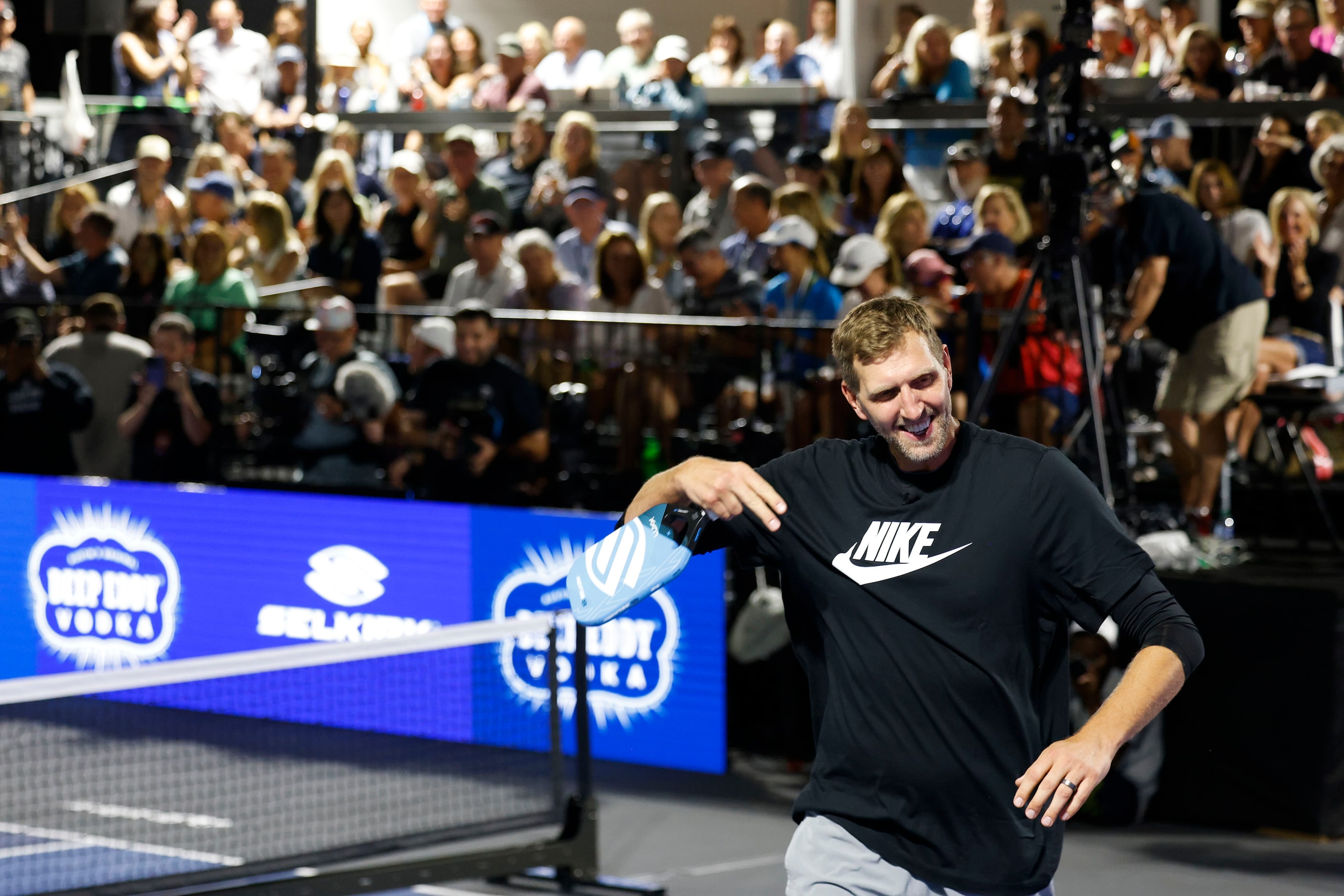 Dallas Mavericks player and basketball hall of famer Dirk Nowitzki hypes the crowd during...