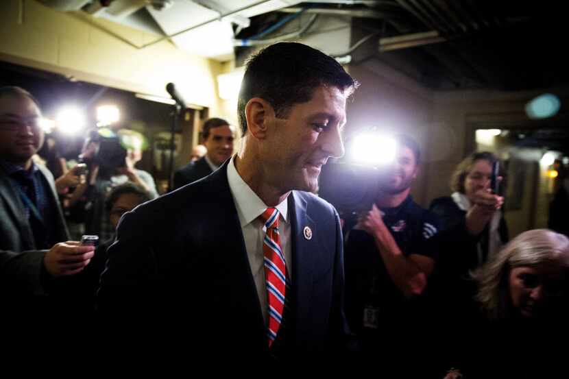  Rep. Paul Ryan (R-Wis.) arrives at the Capitol for a meeting with House Republicans, in...