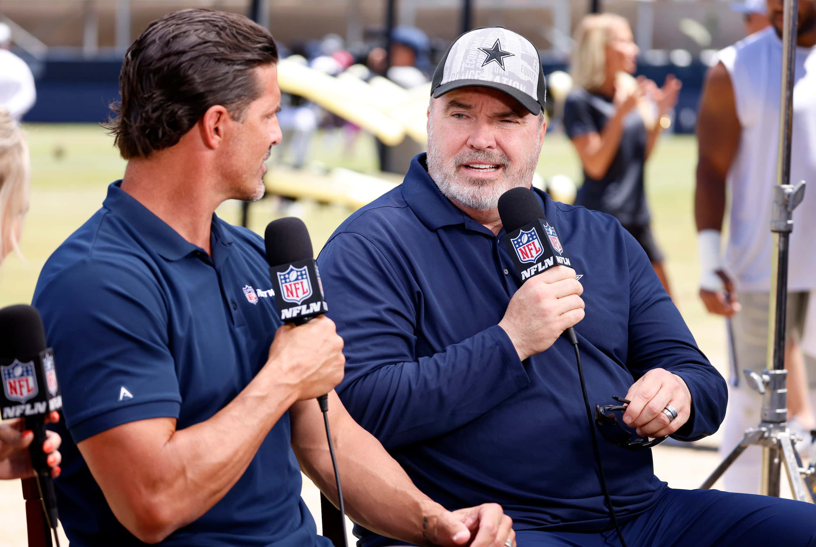 Dallas Cowboys head coach Mike McCarthy  visits with NFL Network’s David Carr following...