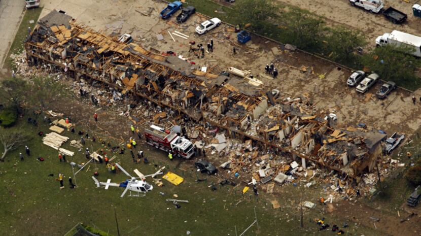 An aerial image shot Thursday shows damage to an apartment complex caused by the explosion...