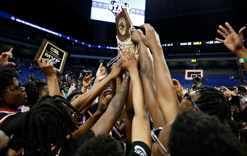 Lancaster celebrates after defeating Killeen Ellison in the UIL Class 5A boys basketball...