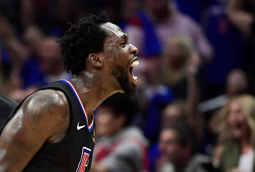 Los Angeles Clippers guard Patrick Beverley celebrates after a scoring play during the...