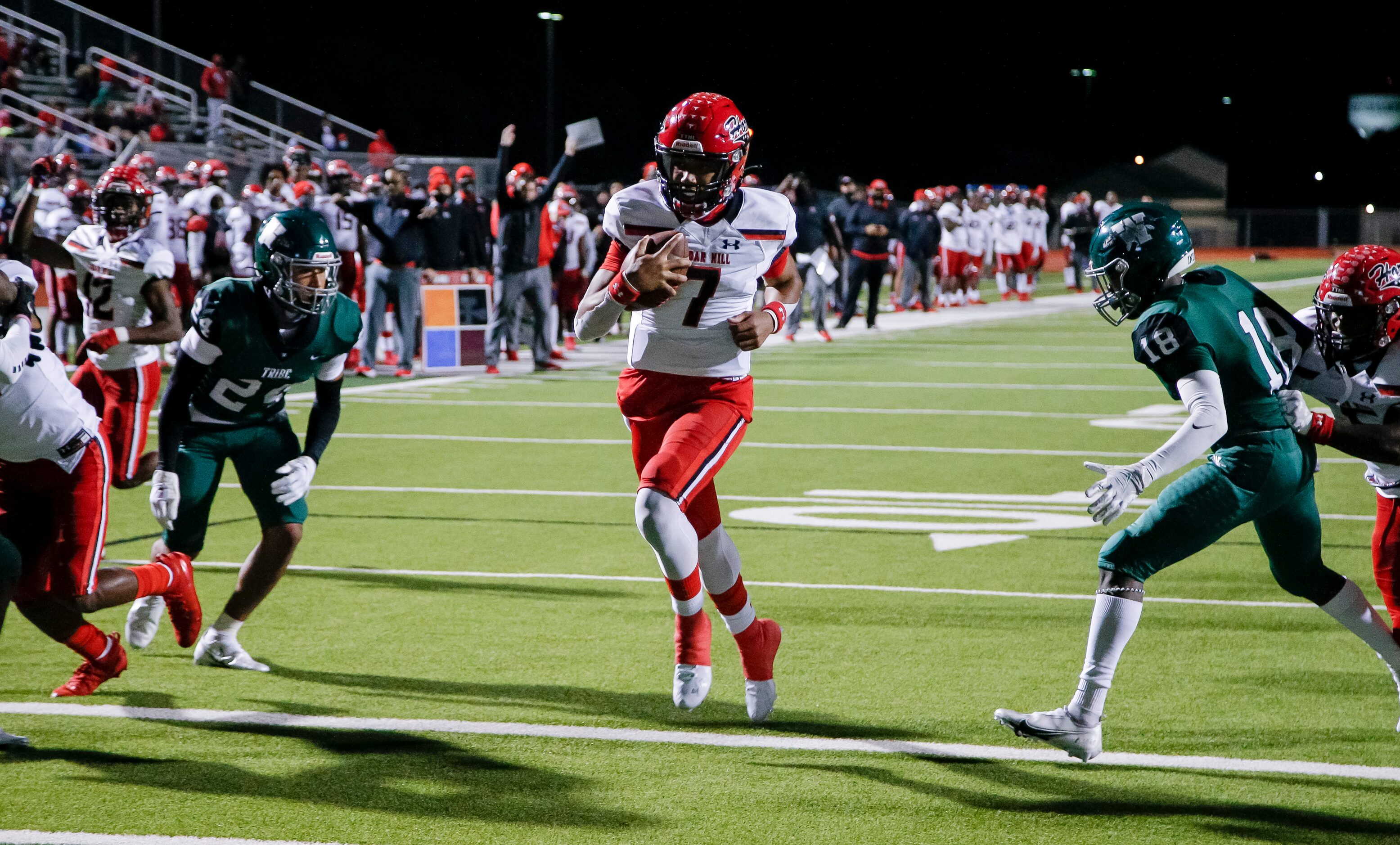 Cedar Hill senior quarterback Kaidon Salter (7) scores a touchdown during the second half of...