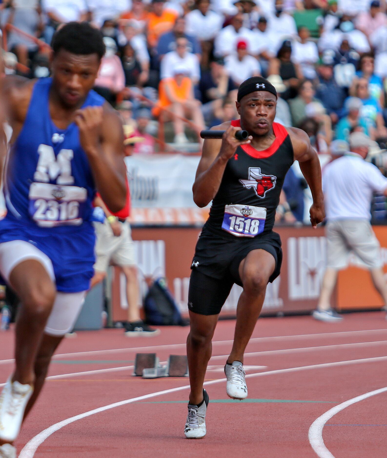Kaleb Green of Cedar Hill competes in the 6A Boys 4x100 meter relay during the UIL state...