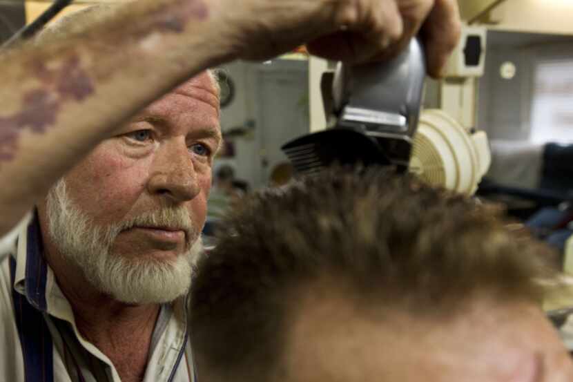Don Williams trims Boyd Gregory's hair at Lester's Style Shop in Mesquite. At Lester's Style...