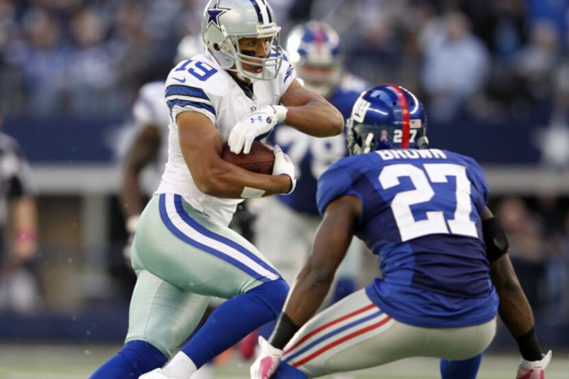 Dallas Cowboys wide receiver Miles Austin (19) runs up the field as New York Giants strong...