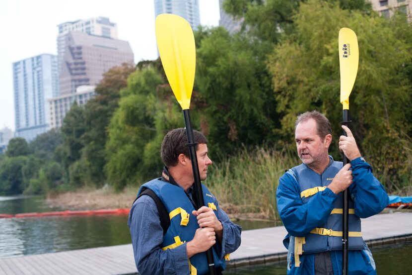 Authors Kevin Fedarko, left, and Brad Tyler, right, talk before a kayak tour on Lady Bird...