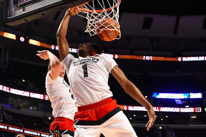 McDonalds High School All-American West's MarquesBolden (1) dunks the ball during the second...