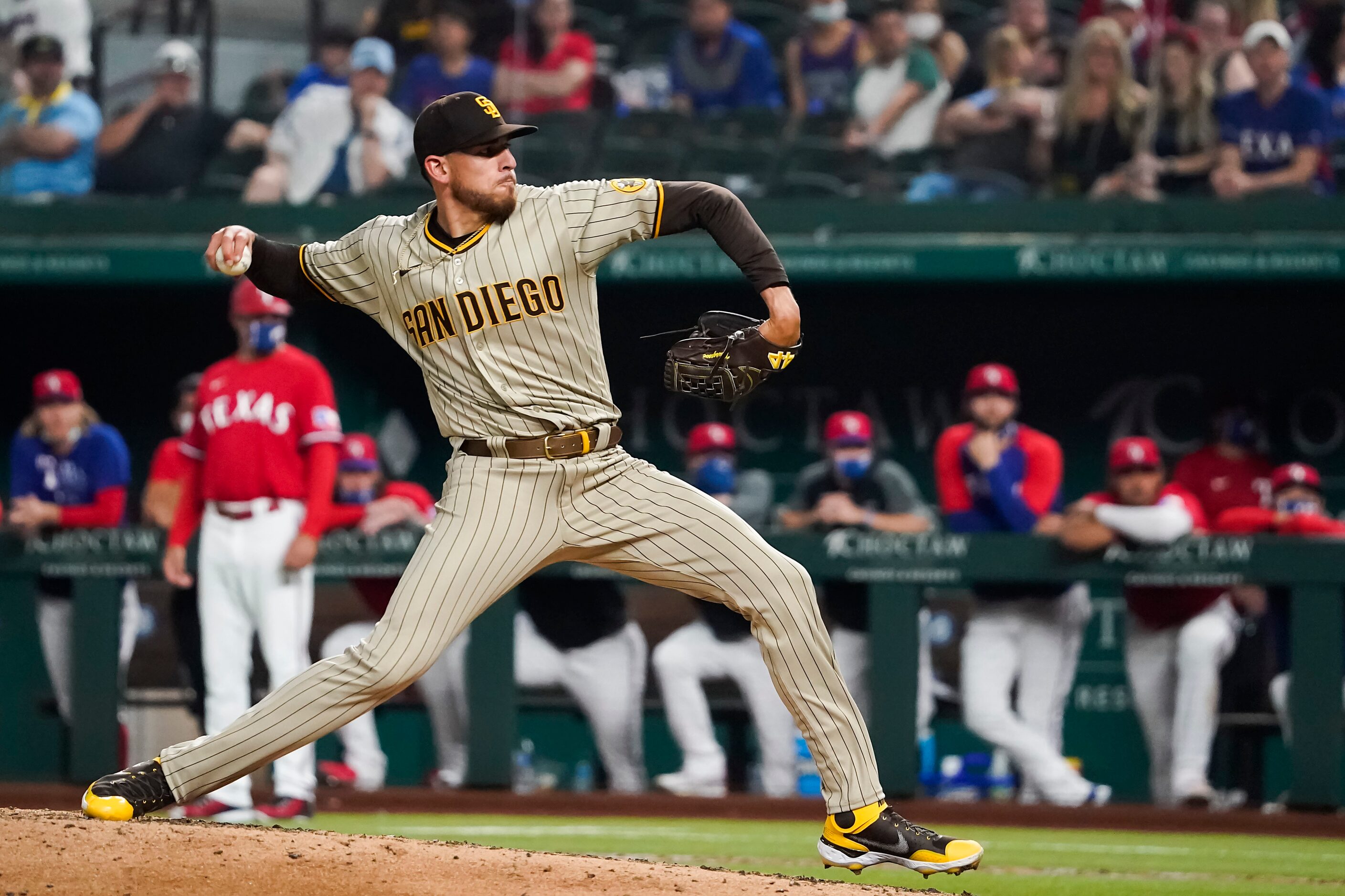 San Diego Padres starting pitcher Joe Musgrove delivers to Texas Rangers center fielder...