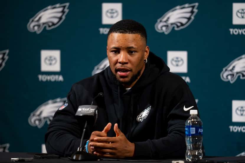 Philadelphia Eagles Saquon Barkley talks to the media during the press conference after...