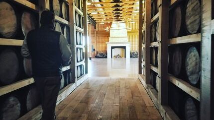 Co-founder Robertson courses the "barrel breezeway" path leading to the Oak Room, a...
