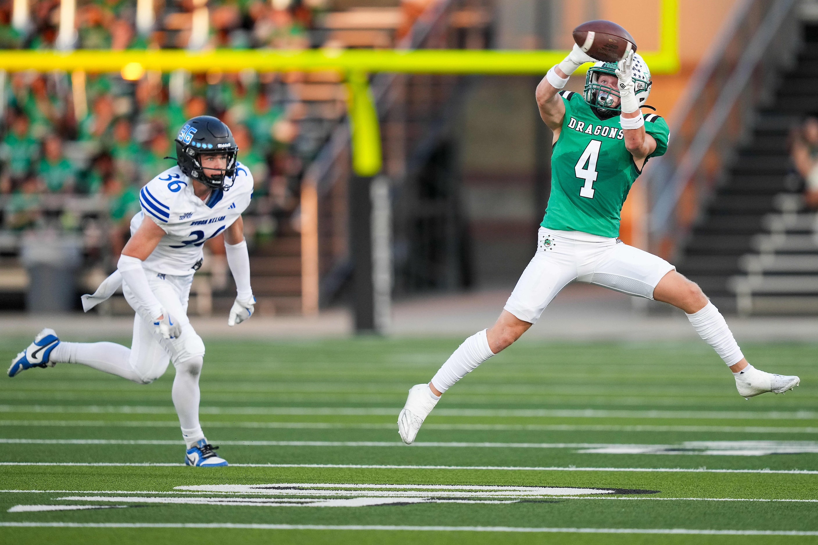 Southlake Carroll wide receiver Luc Jacquemard (4) catches a pass as Trophy Club Byron...