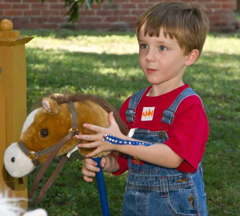 Getting ready to kick up some old-fashioned fun in the stick horse race at Dallas Heritage...