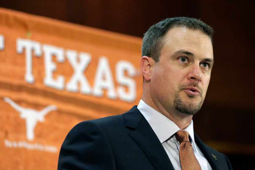 FILE - In this Nov. 27, 2016, file photo, Tom Herman talks to the media during a news...