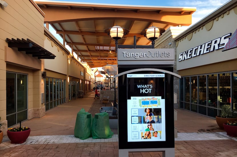 The Tanger Outlets shopping center is getting ready to open Friday near the Texas Motor...