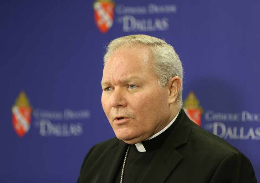 Bishop Edward J. Burns of the Catholic Diocese of Dallas and other priests from the Dallas...