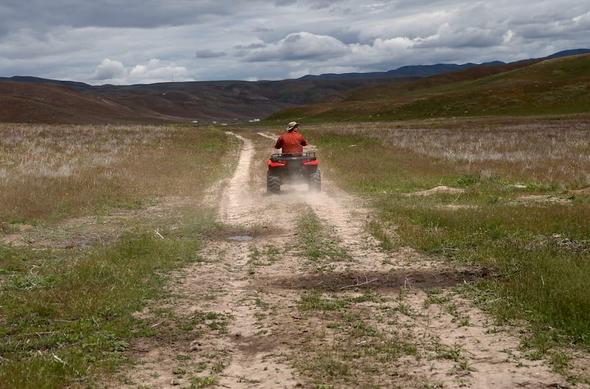 Tyler Johnson of Land Advisors Organization gives a tour of the thousands of acres outside...