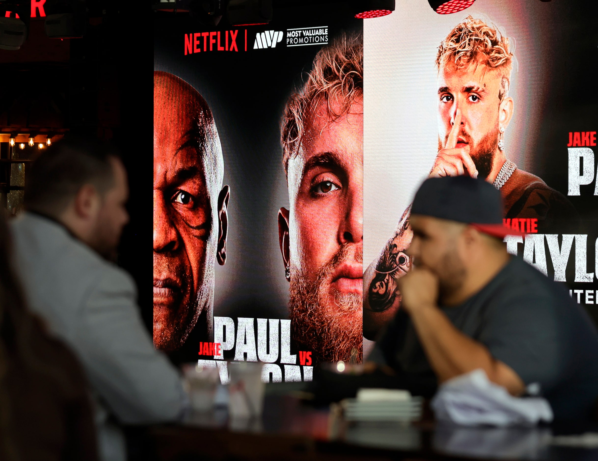 Ahead of the July fight at AT&T Stadium, fans wait to see boxers Mike Tyson and Jake Paul...