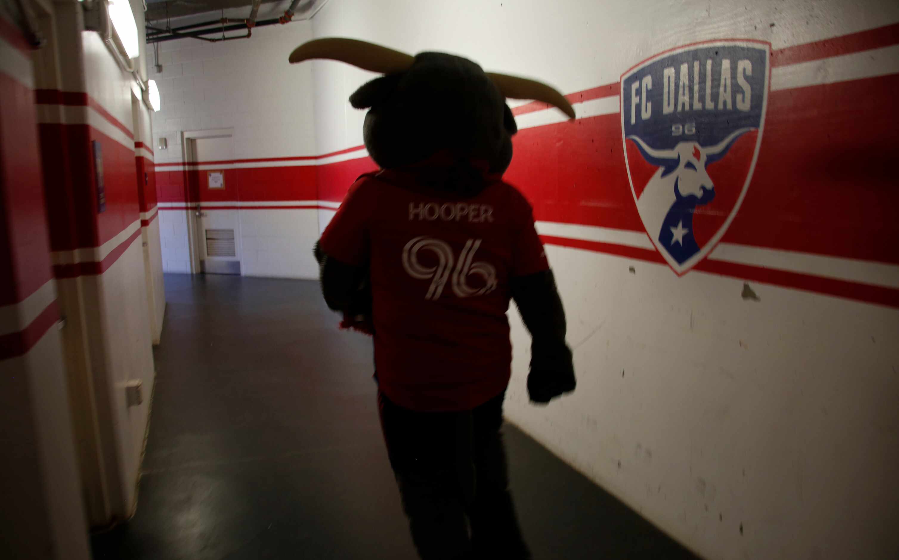 FC Dallas mascot "Hooper" leaves the locker room area and heads to the field prior to the...