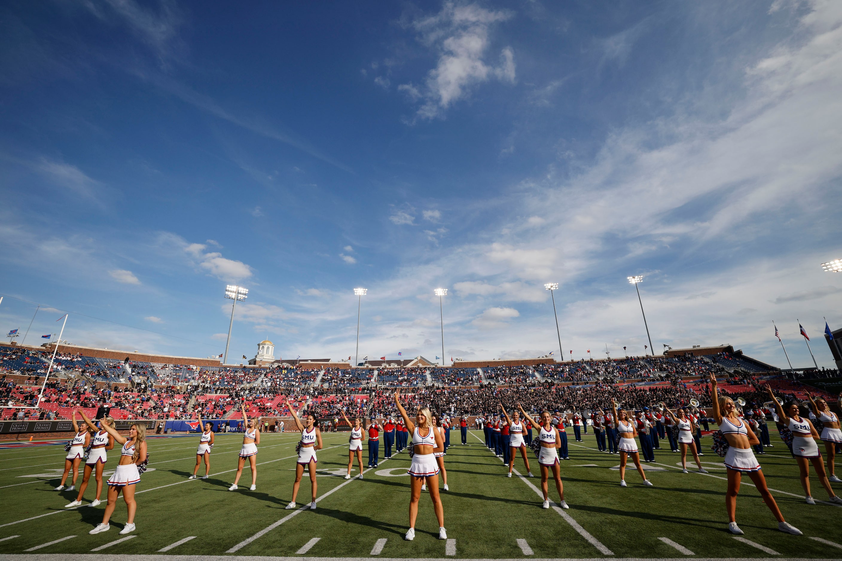 SMU cheerleaders perform before an NCAA college football game against the Boston College at...