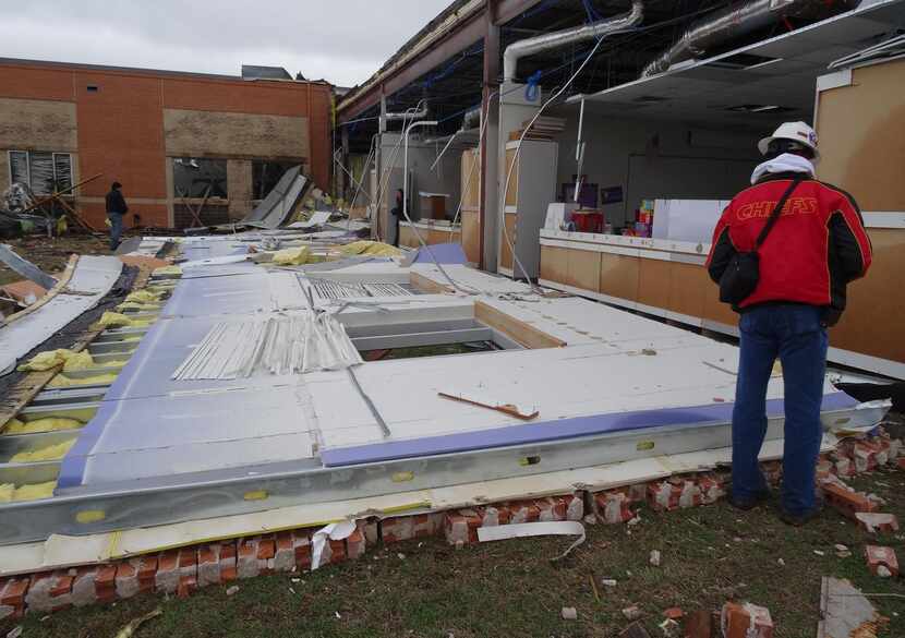 
Storm damage to Donald T. Shields Elementary school, (part of Red Oak ISD), shown Dec. 28...