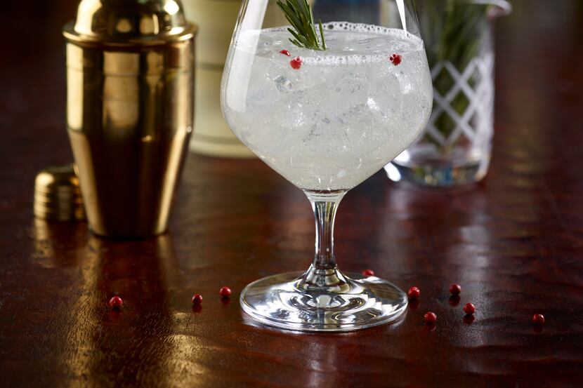 This gin and tonic - with rosemary and a bit of ginger liqueur - will take you back to...
