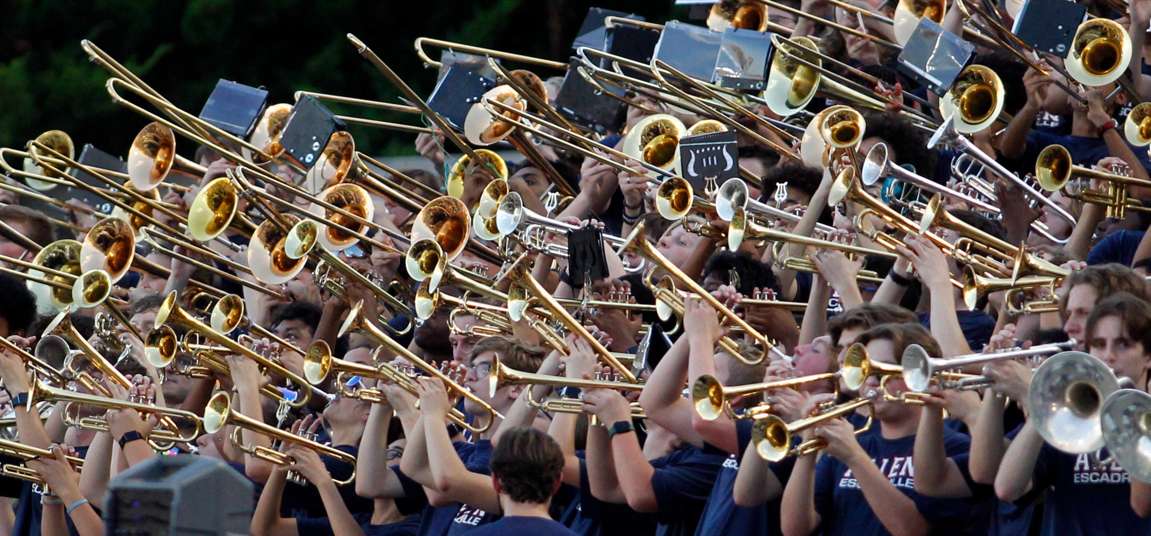 Touted as the largest band in the country, members of the brass section of the Allen High...