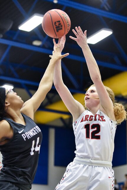 Argyle senior forward Vivian Gray (12) shoots a jump shot over Princeton senior forward...