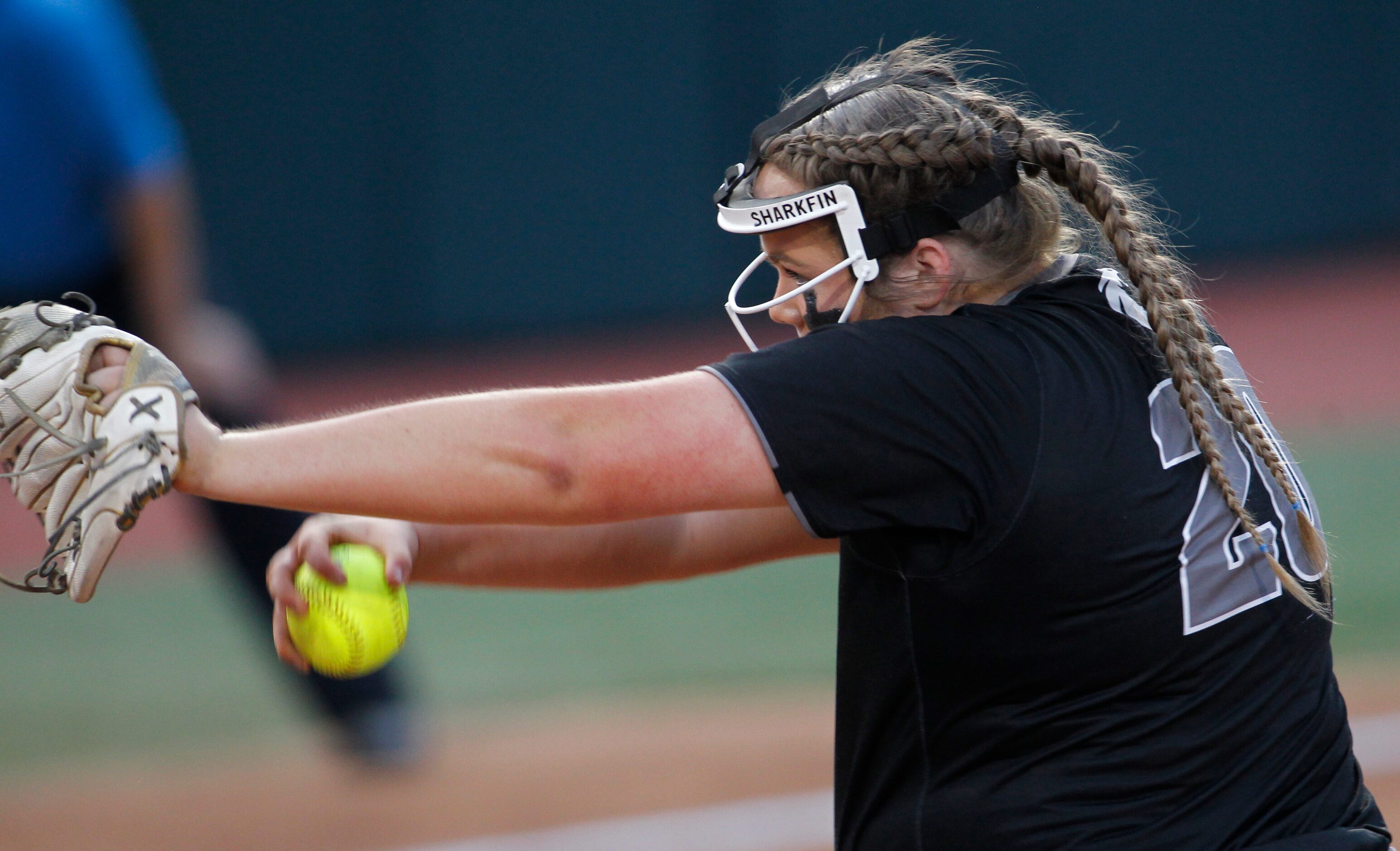 Denton Guyer pitcher Finley Montgomery (20) delivers a pitch to a Bridgeland batter during...