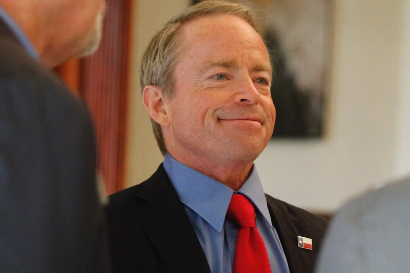 Texas Senate candidate Phillip Huffines mingles with the crowd at a fundraiser at the...