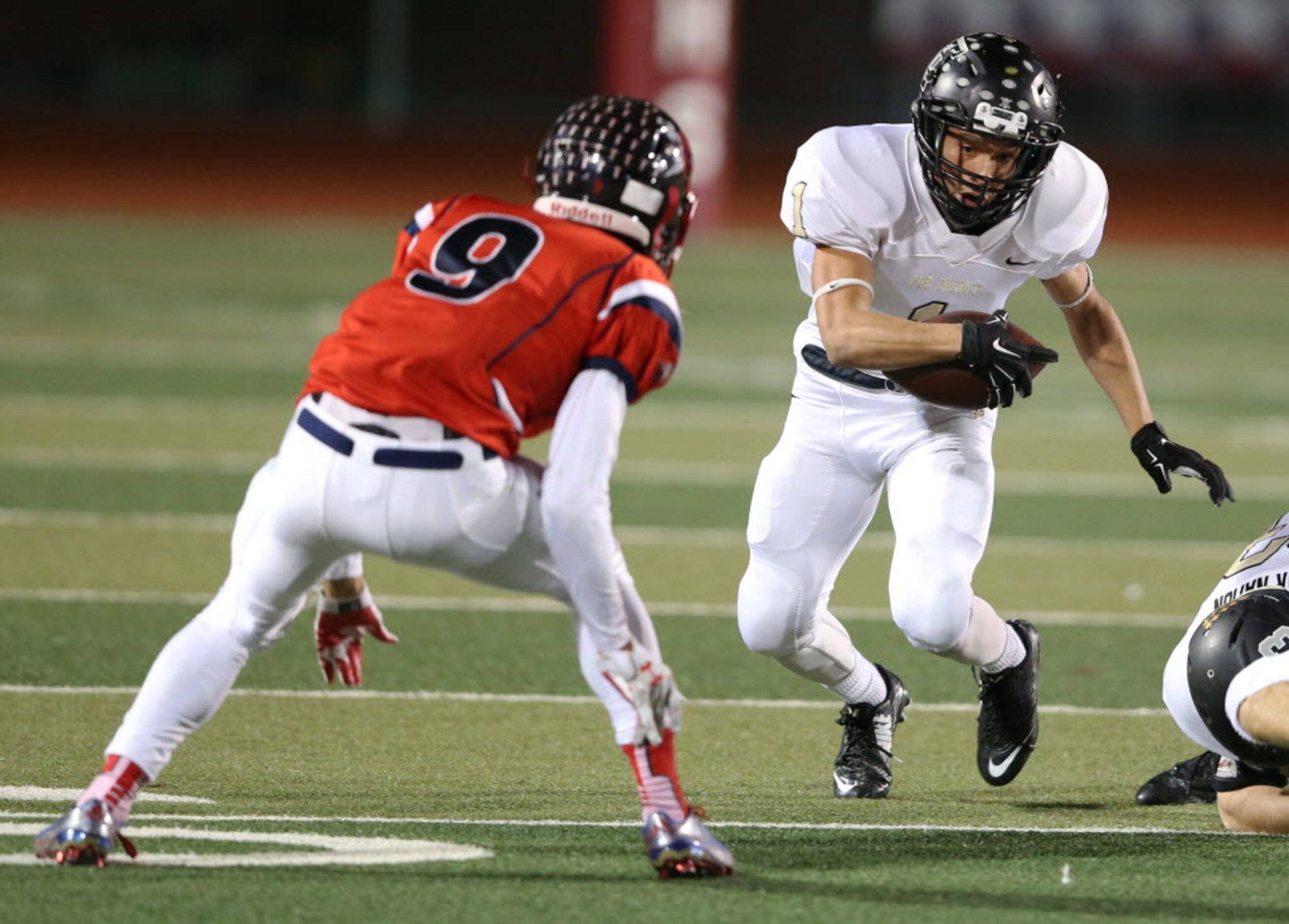 The Colony's Josh Chow (1) runs up the field as Frisco Centennial's Raleigh Texada (9)...