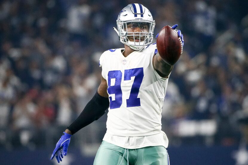 Dallas Cowboys defensive end Taco Charlton (97) reacts after recovering a fumble during an...