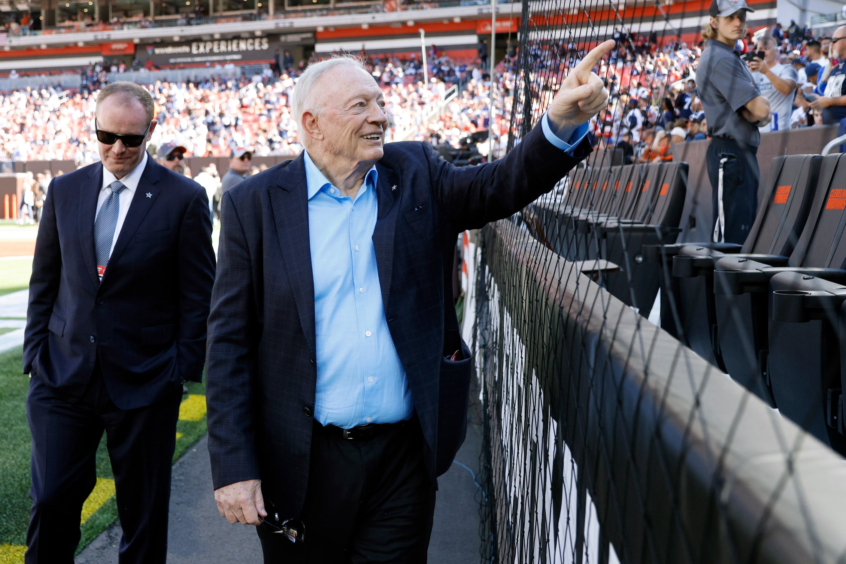 Dallas Cowboys owner Jerry Jones acknowledges fans before the first half against the...