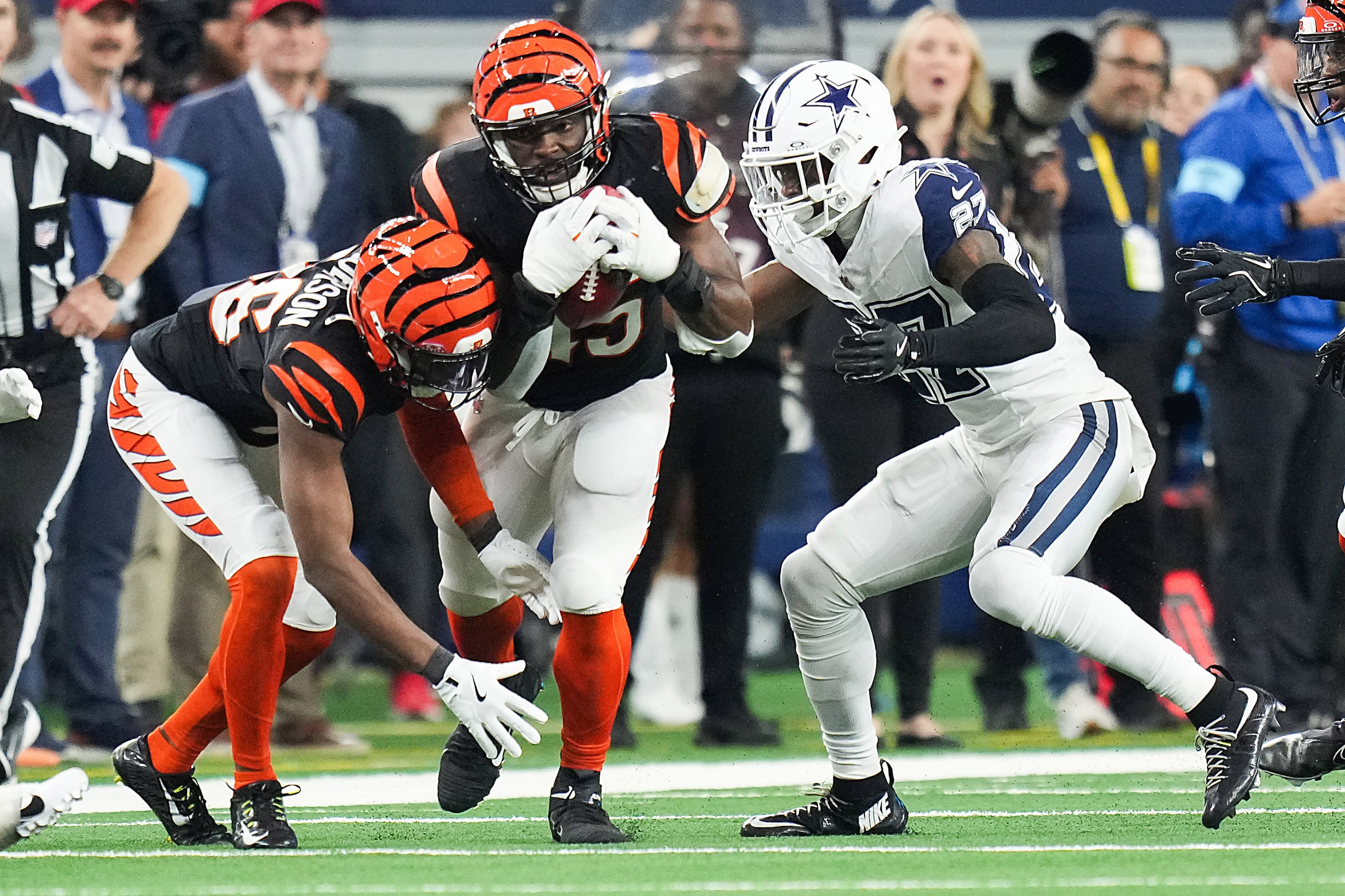 Cincinnati Bengals linebacker Maema Njongmeta (45) recovers a muffed punt return by Dallas...