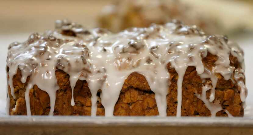 Freshly baked apple cinnamon walnut bread with icing