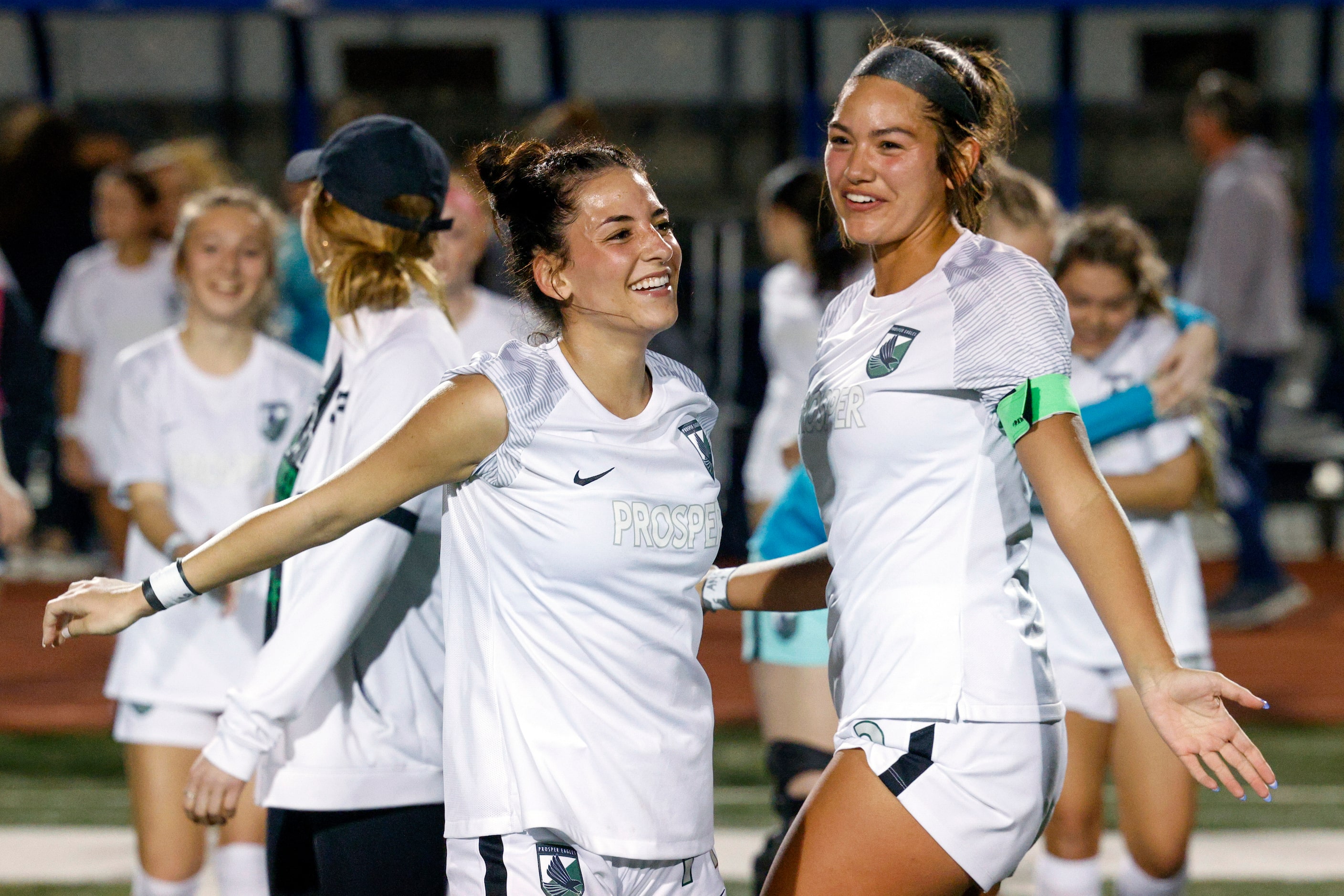 Prosper’s Emma Yolinsky (left) and Beya Rosales celebrate after winning a UIL 6A bi-district...