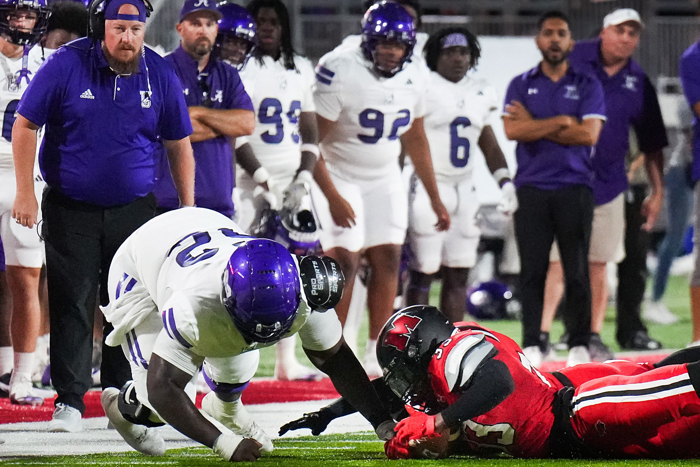 Melissa linebacker Jaylon Frasier (33) recovers a fumble by Anna quarterback Ziondre...