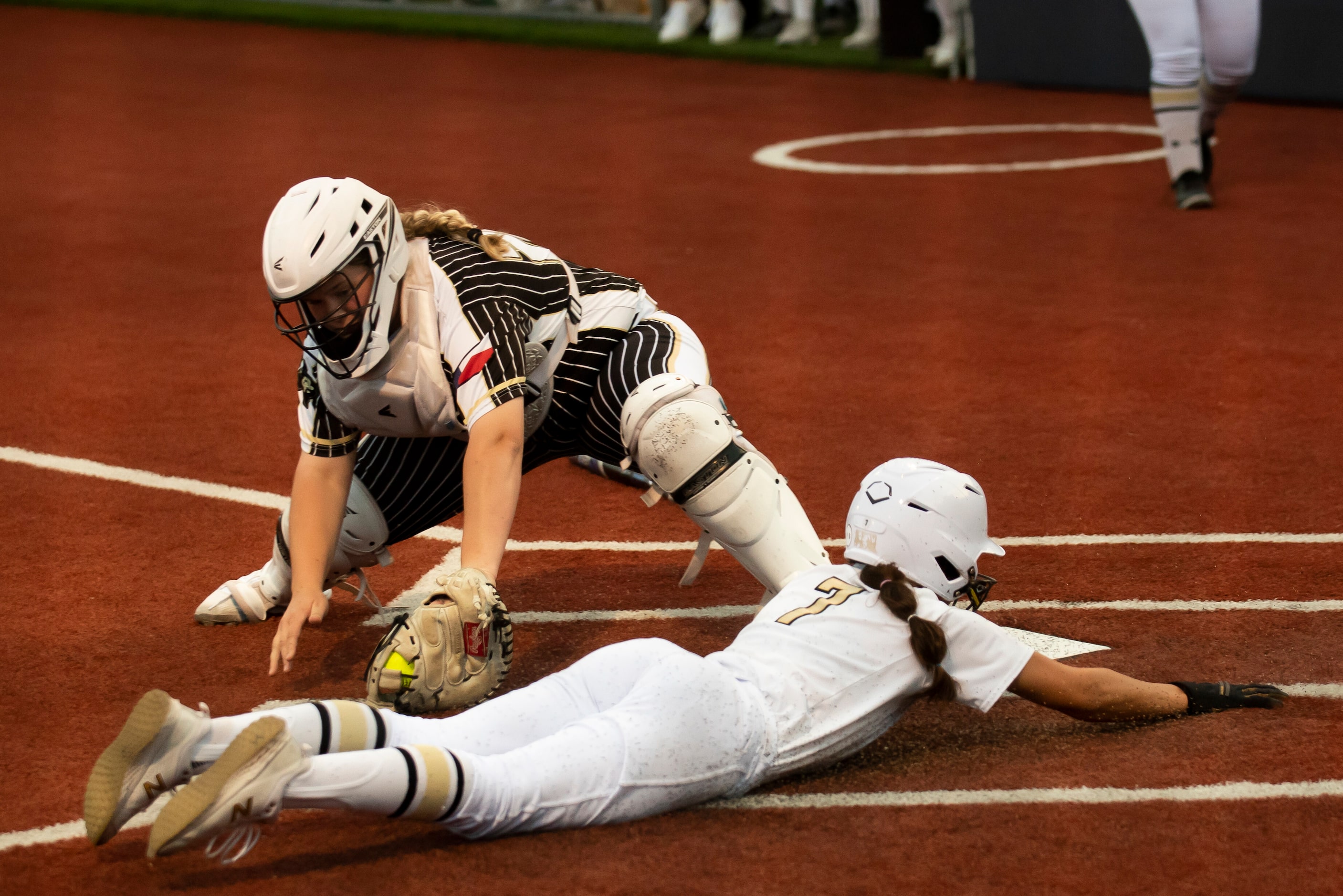 Royse City’s Haley Gardella (22) attempts to tag out The Colony’s Sabrina Wick (7) during...