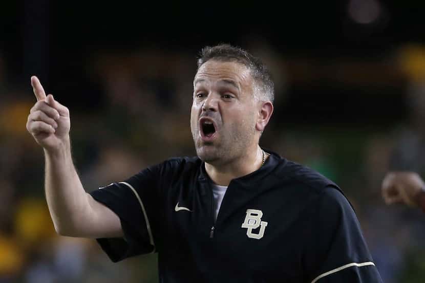 Baylor head coach Matt Rhule reacts to a play against West Virginia in the first half of an...
