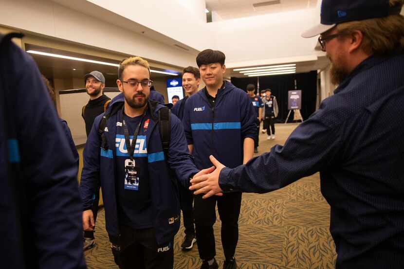FILE - Jonathan "HarryHook" Tejedor Rua of the Dallas Fuel high-fives a fan following their...