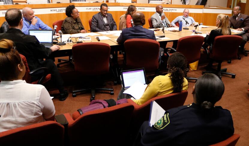 Dallas County Commissioner John Wiley Price (right) took part in a meeting with interim...