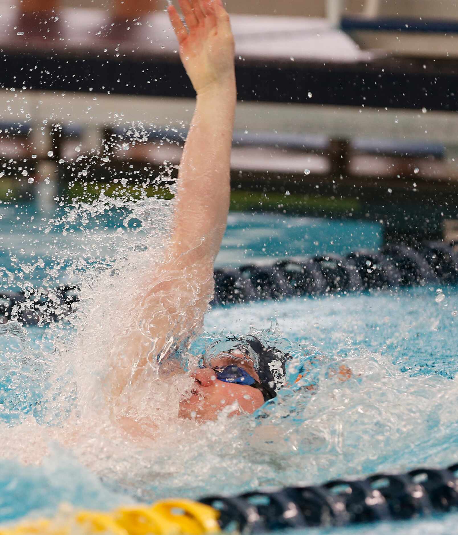 Jonathan MiChareis in backstroke for 200 yard Medley Relay. UIL boys 5A swim finals on...