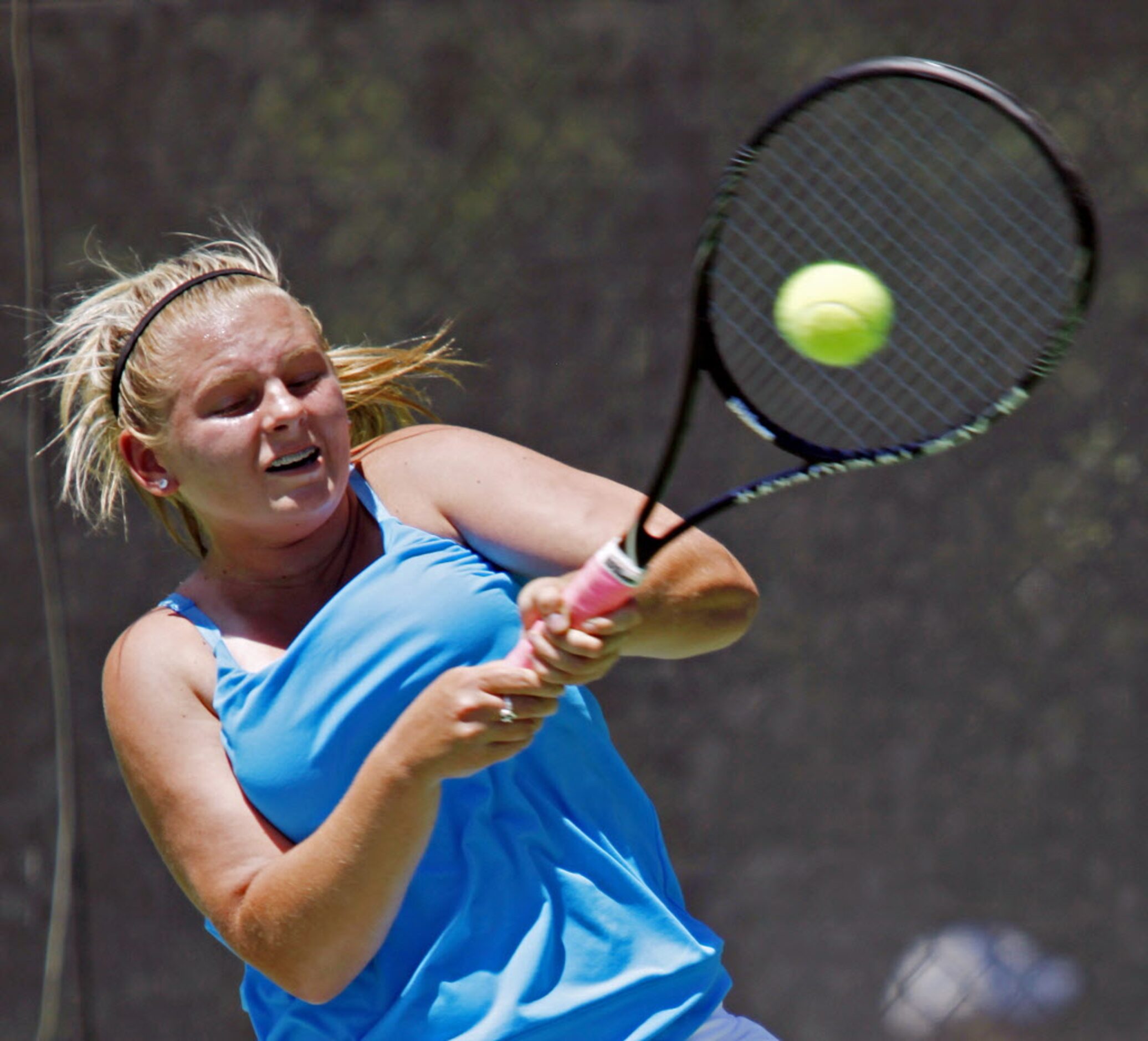 North Richland Hills' Riley Reeves hits a ball towards Rylee Braeden of Houston Cypress...