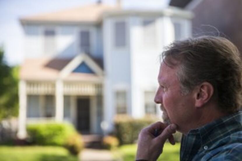  Henry S. Miller CEO Greg Miller stands outside the home of Ruth Sanders after a negotiation.