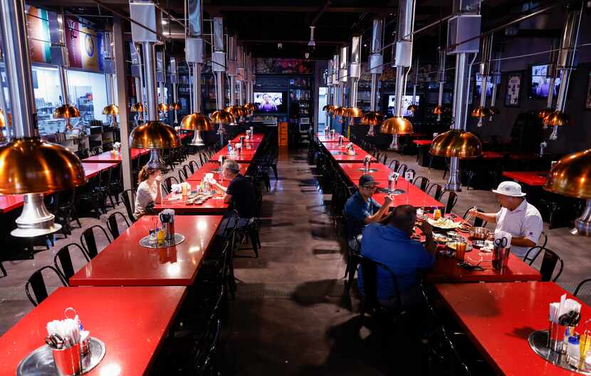 Interior of Moo Dae Po Korean barbecue restaurant Friday, July 22, 2022 in Carrollton.