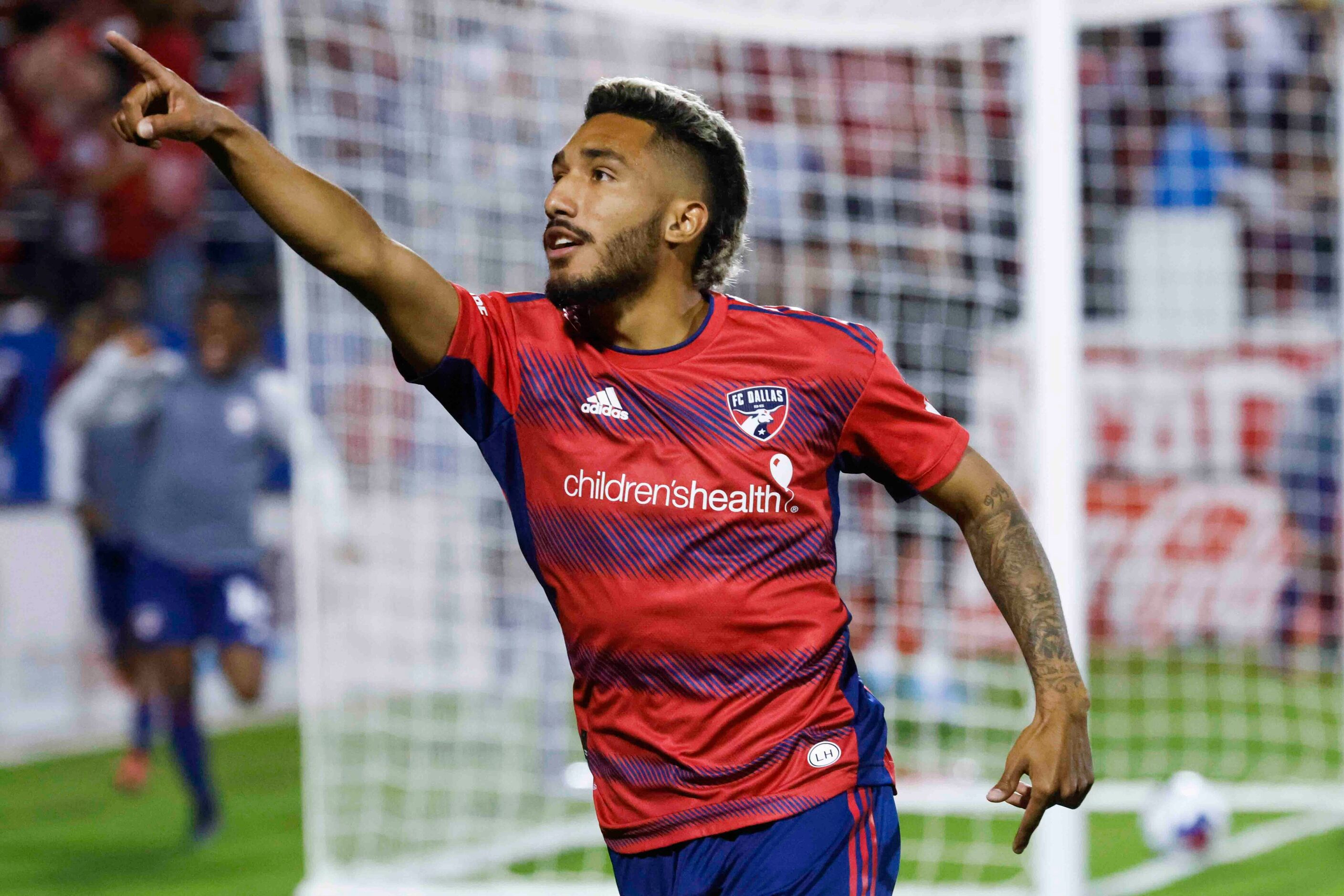 FC Dallas forward Jesús Ferreira celebrates a goal as he leads his team during the second...