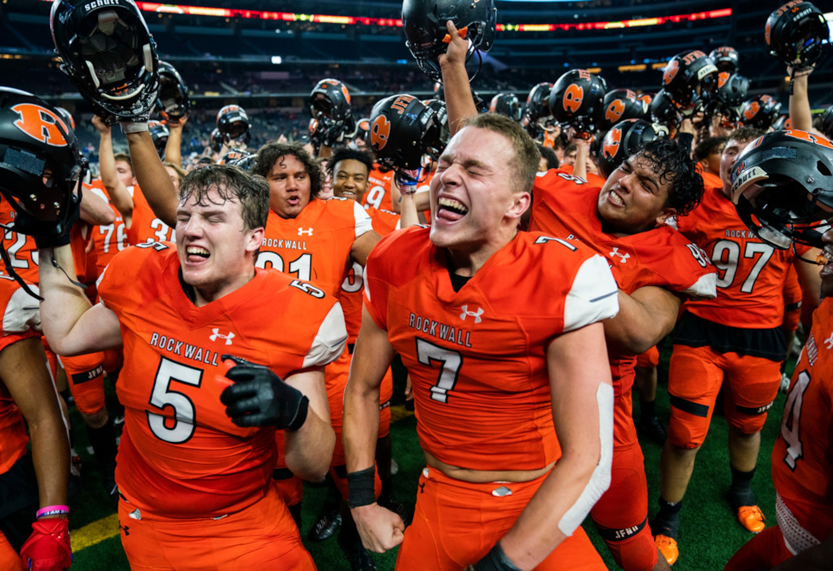 Rockwall celebrates a 60-59 win over Allen in a Class 6A Division I area-round high school...