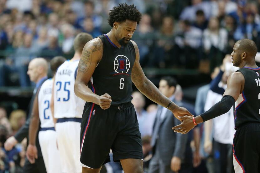 Los Angeles Clippers center DeAndre Jordan (6) and guard Chris Paul (3) celebrate in the...